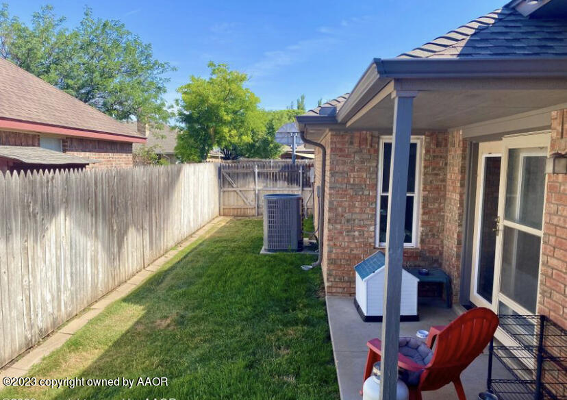 7110 Rochelle Lane Amarillo, TX 79109 - Photo 7 of 21 Side patio