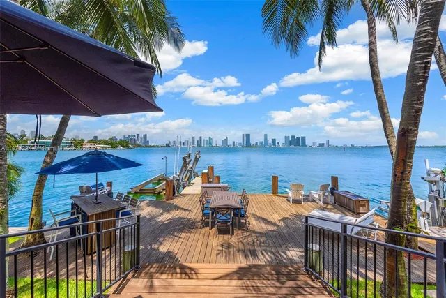 a view of a chairs and table in the terrace