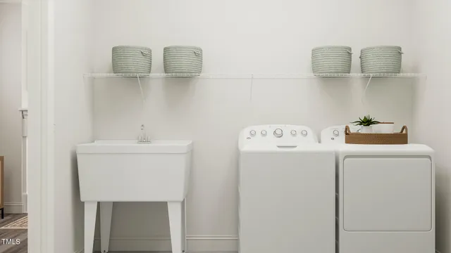 a utility room with dryer and washer