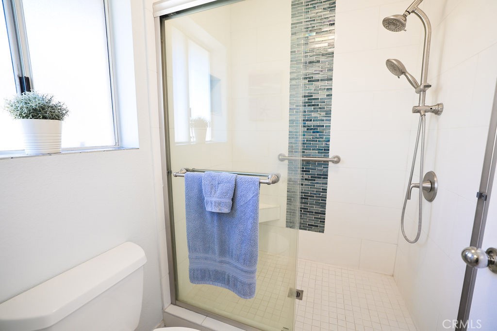 9057 Mandarin Lane Riverside, CA 92508 - Photo 24 of 36 Remodeled Primary Bathroom with walk-in shower
