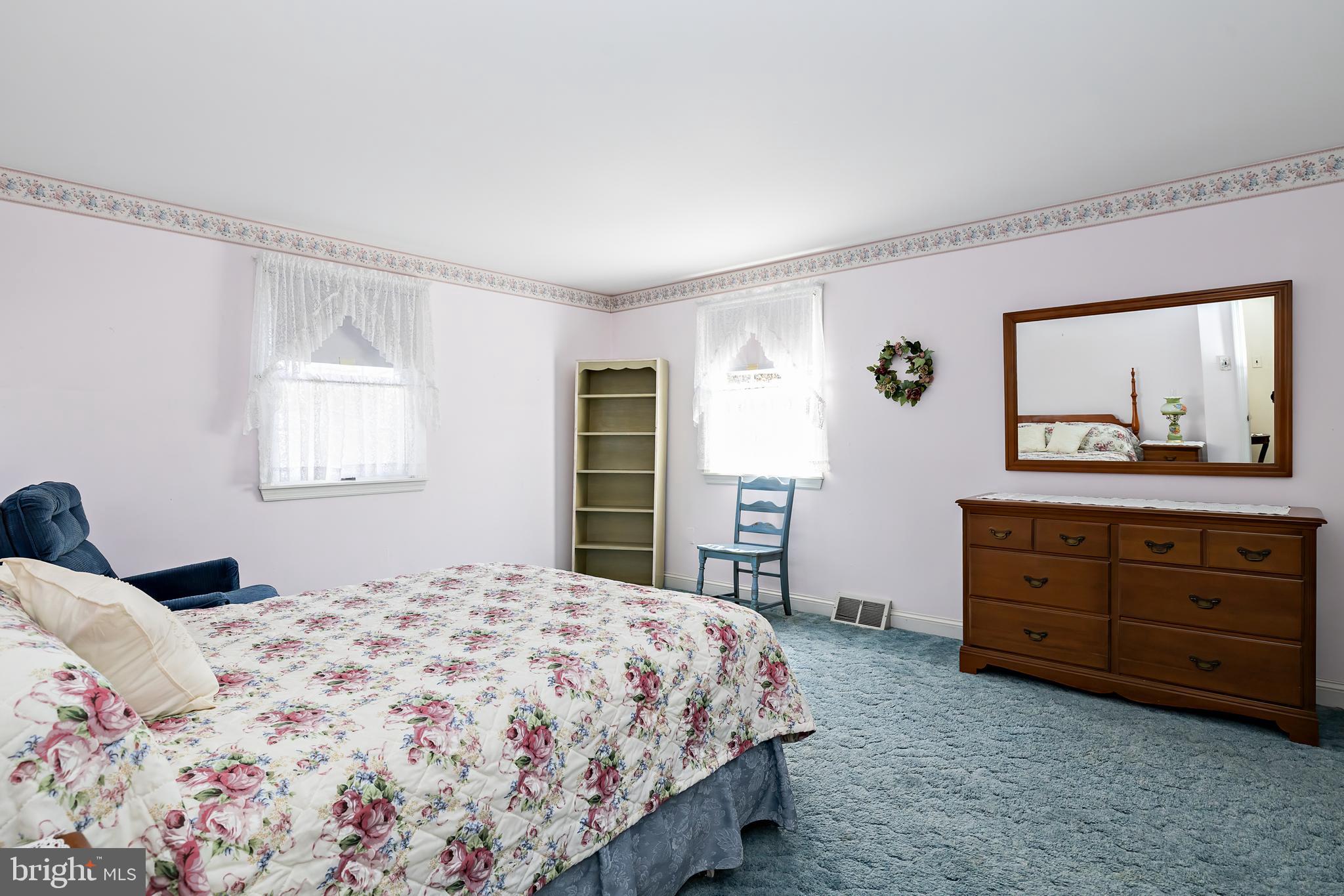 408 Yale Road Haddonfield, NJ 08033 - Photo 16 of 29 a bedroom with a bed and a dresser