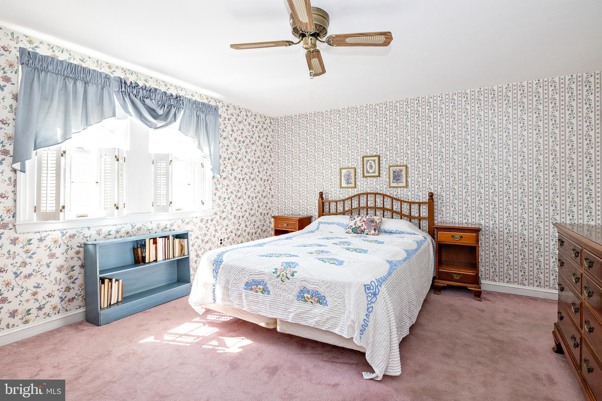 408 Yale Road Haddonfield, NJ 08033 - Photo 19 of 29 a bedroom with a bed and a table
