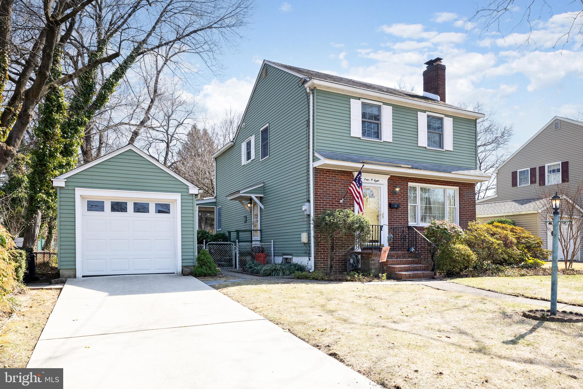408 Yale Road Haddonfield, NJ 08033 - Photo 3 of 29 a front view of a house with a yard