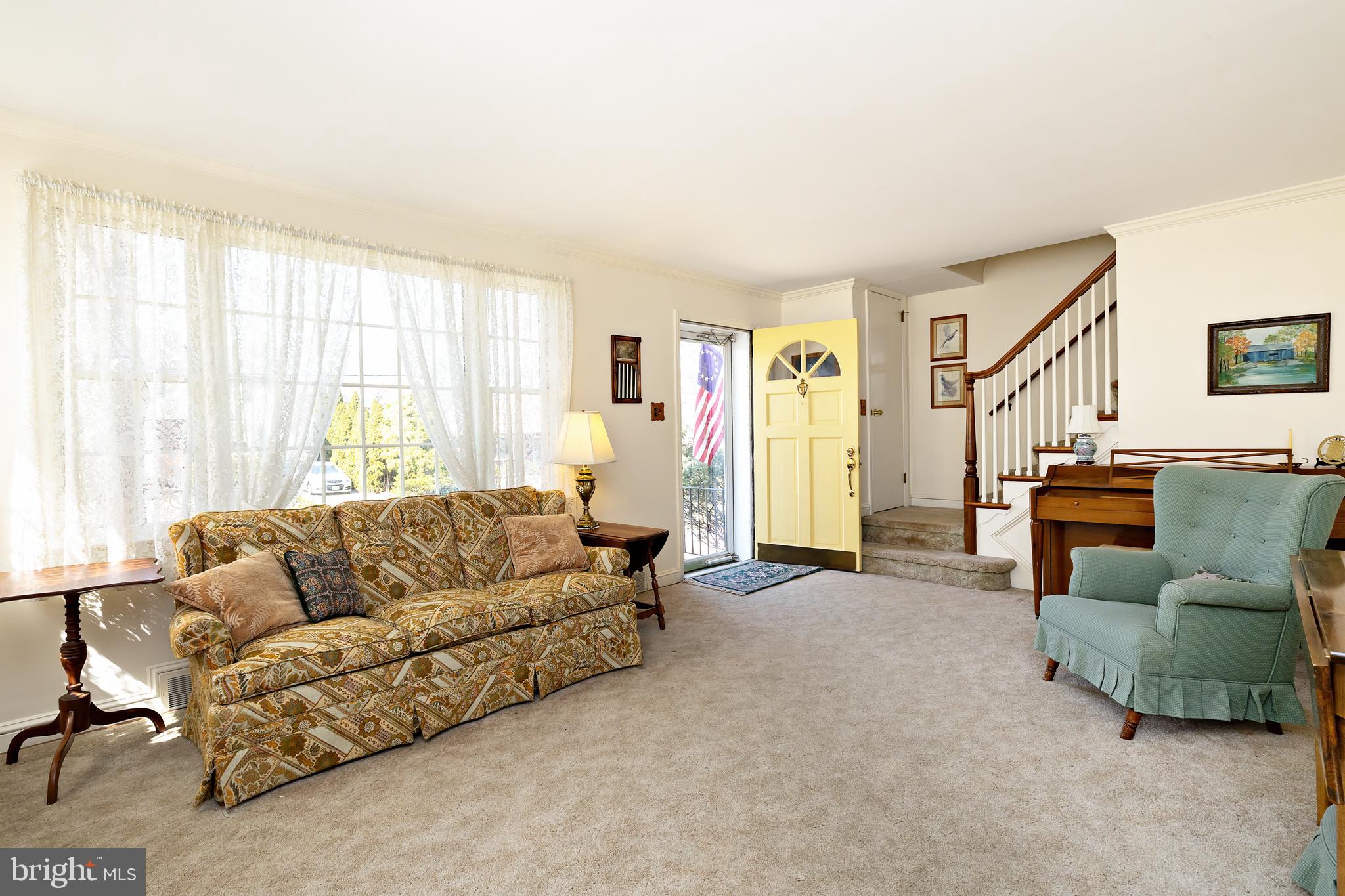 408 Yale Road Haddonfield, NJ 08033 - Photo 5 of 29 a living room with furniture and a large window