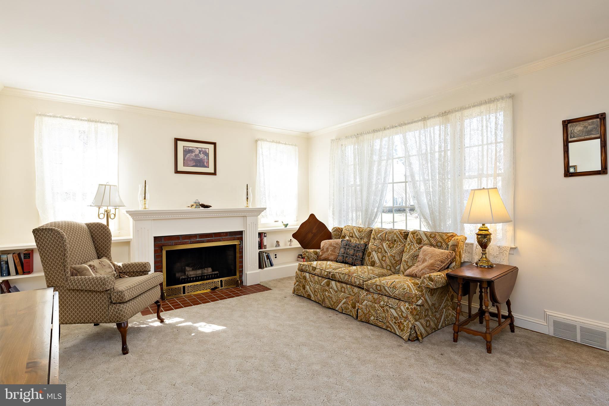 408 Yale Road Haddonfield, NJ 08033 - Photo 6 of 29 a living room with furniture and a fireplace