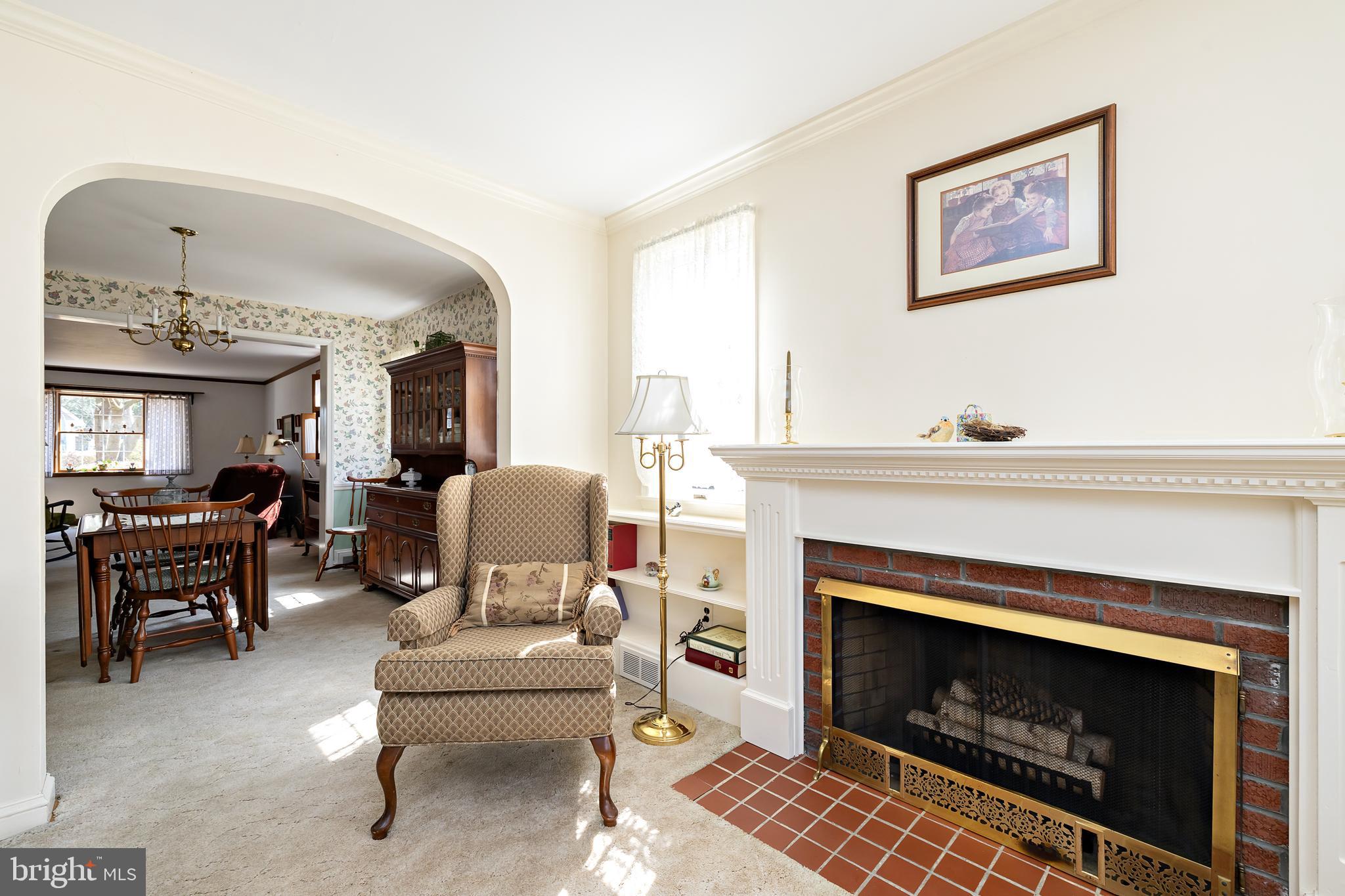 408 Yale Road Haddonfield, NJ 08033 - Photo 7 of 29 a living room with furniture and a fireplace