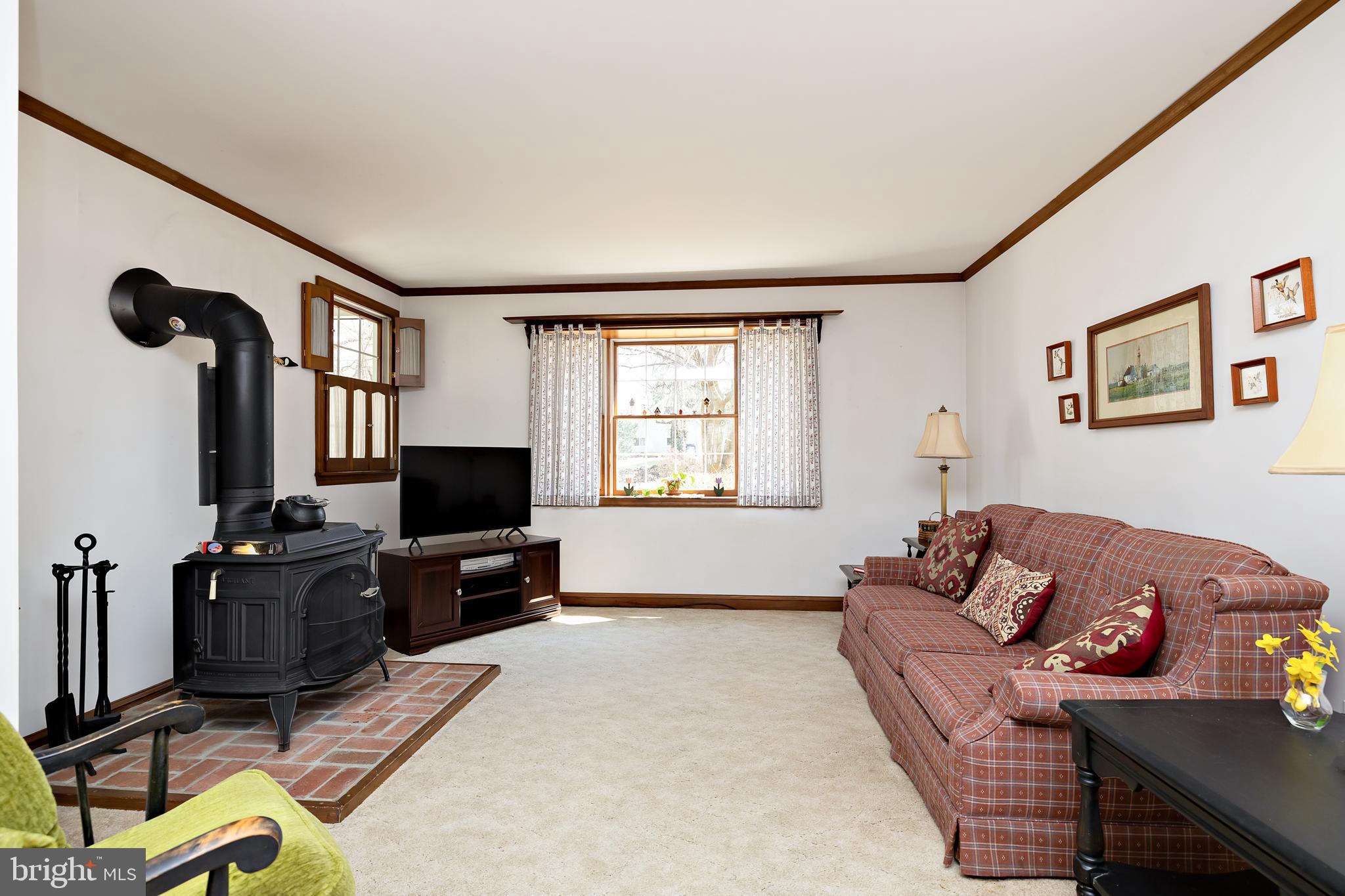 408 Yale Road Haddonfield, NJ 08033 - Photo 9 of 29 a living room with furniture and a flat screen tv