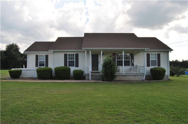 9575 Powells Chapel Road Murfreesboro, TN 37129 - Photo 1 of 18 a view of a house with a yard and porch