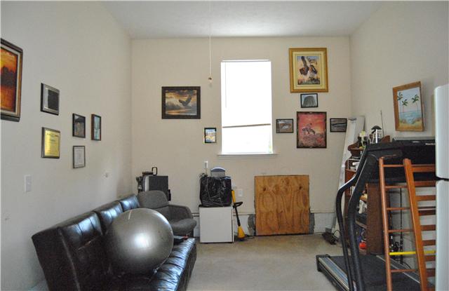 9575 Powells Chapel Road Murfreesboro, TN 37129 - Photo 14 of 18 a living room with furniture and a lamp