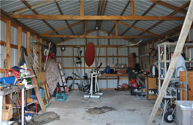 9575 Powells Chapel Road Murfreesboro, TN 37129 - Photo 18 of 18 a view of a storage room with musical instruments