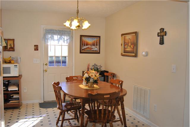 9575 Powells Chapel Road Murfreesboro, TN 37129 - Photo 5 of 18 a dining room with furniture and chandelier