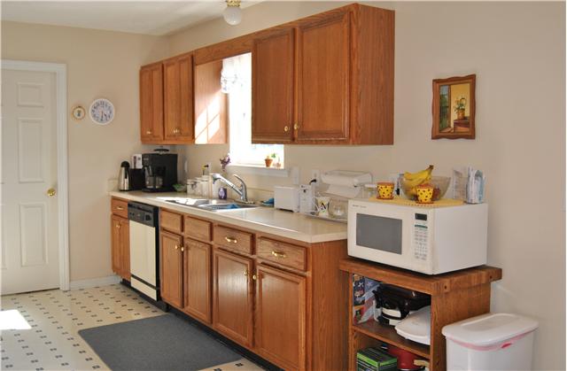 9575 Powells Chapel Road Murfreesboro, TN 37129 - Photo 6 of 18 a kitchen with a sink cabinets and window