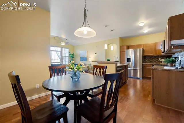 a kitchen that has a sink and a stove