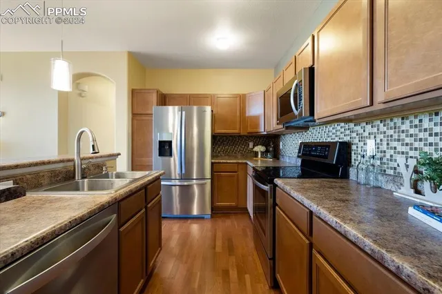 a view of a dining room with furniture