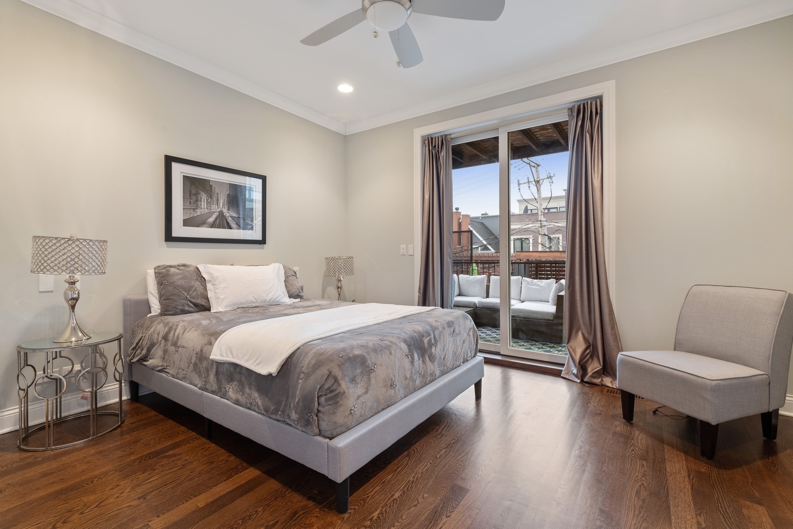 2019 North Racine Avenue, Unit 2 Chicago, IL 60614 - Photo 8 of 14 a bedroom with a bed and a large window