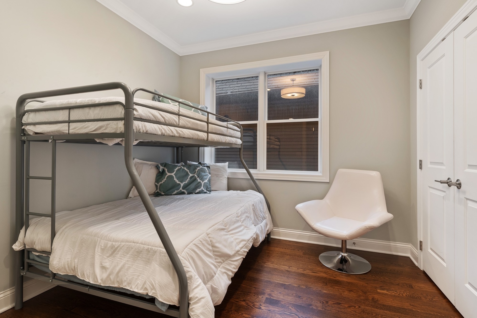2019 North Racine Avenue, Unit 2 Chicago, IL 60614 - Photo 10 of 14 a bedroom with a bed and a window
