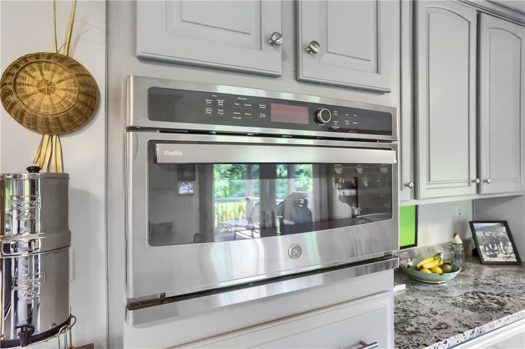 595 Trusel Road Portersville, PA 16051 - Photo 19 of 48 a kitchen with a stove and a microwave