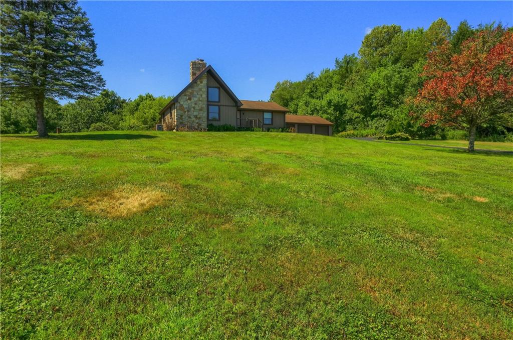 595 Trusel Road Portersville, PA 16051 - Photo 2 of 48 a view of a house with a yard