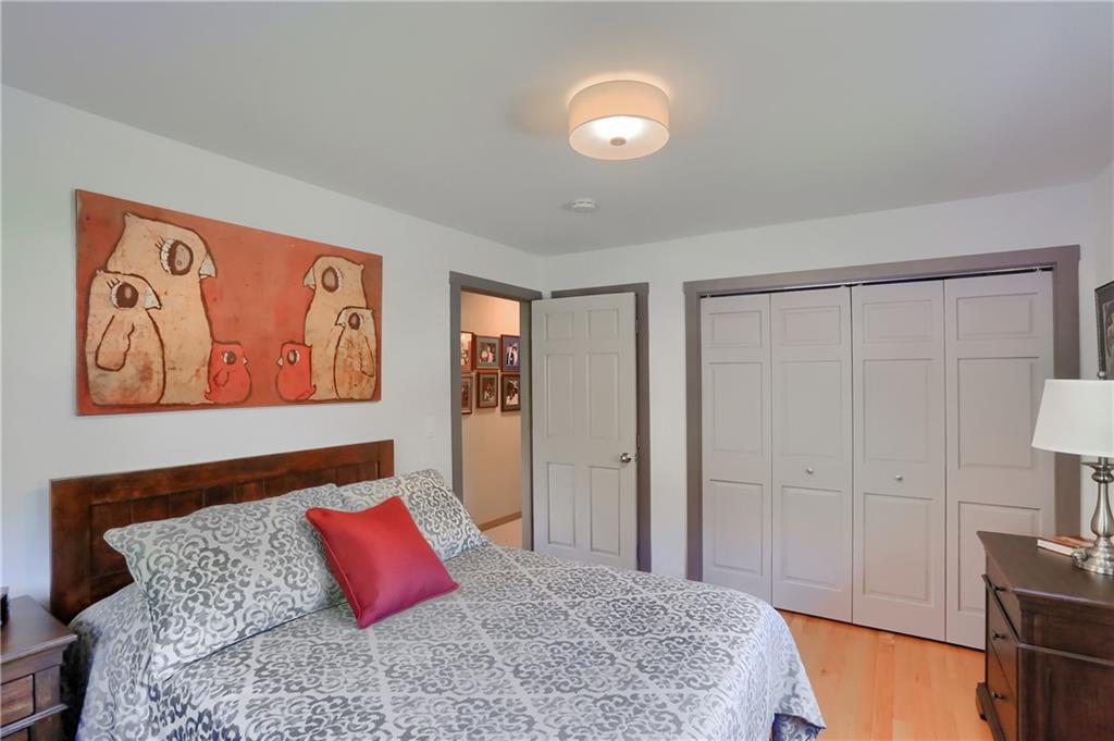 595 Trusel Road Portersville, PA 16051 - Photo 25 of 48 a bedroom with a bed and cupboard