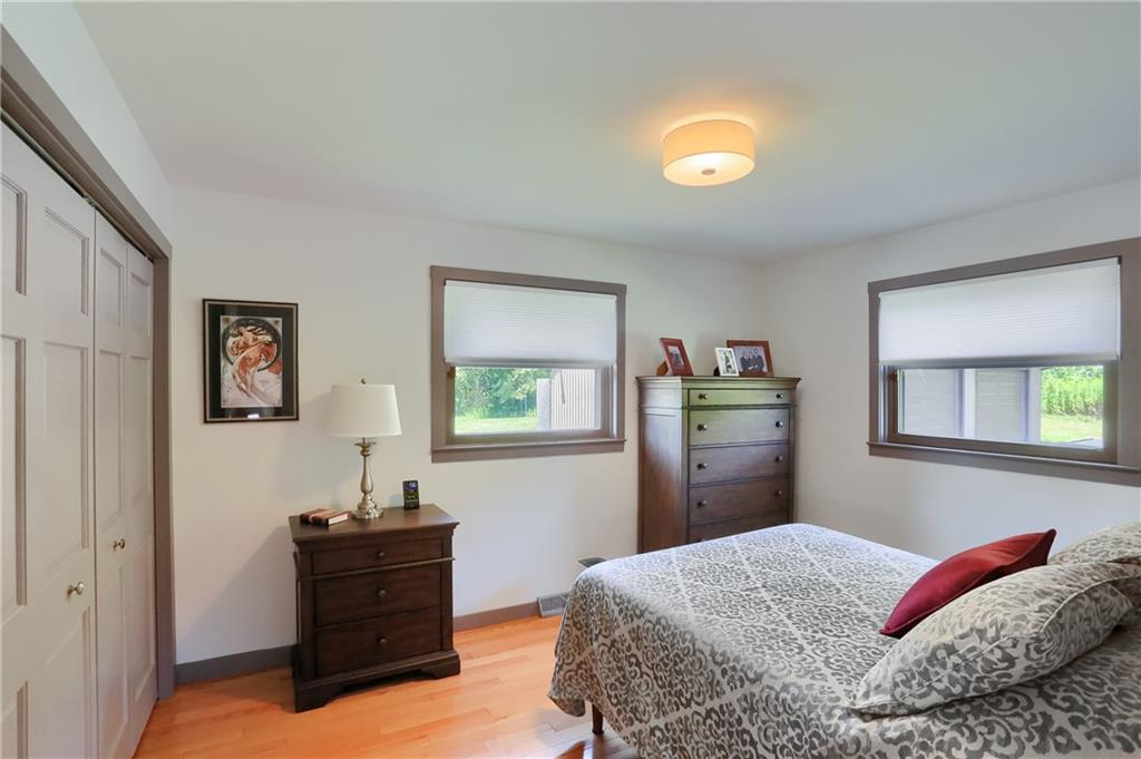 595 Trusel Road Portersville, PA 16051 - Photo 26 of 48 a bedroom with a bed and a dresser