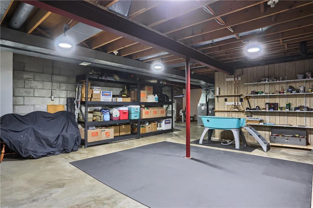 595 Trusel Road Portersville, PA 16051 - Photo 39 of 48 a view of a storage room with racks