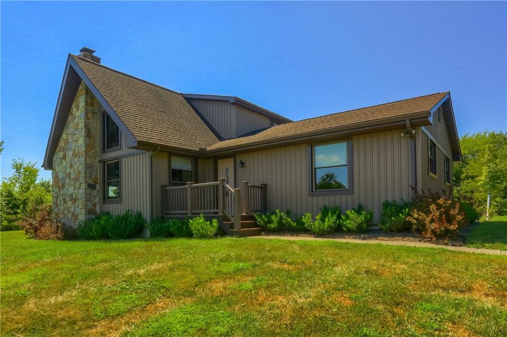 595 Trusel Road Portersville, PA 16051 - Photo 4 of 48 a view of a house with backyard and garden