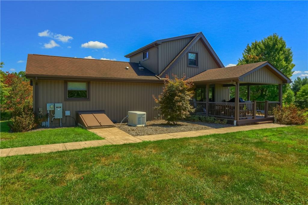 595 Trusel Road Portersville, PA 16051 - Photo 41 of 48 a front view of a house with garden