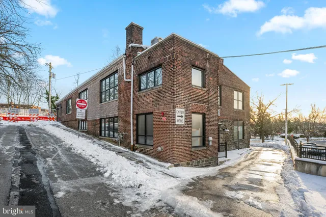 a view of a patio with table and chairs and potted plants