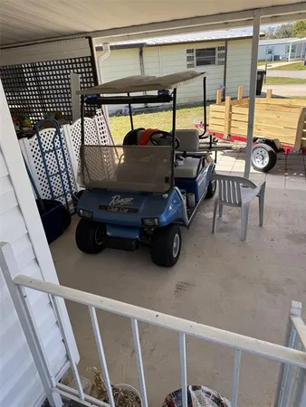 a kitchen with a dining table chairs and granite counter tops