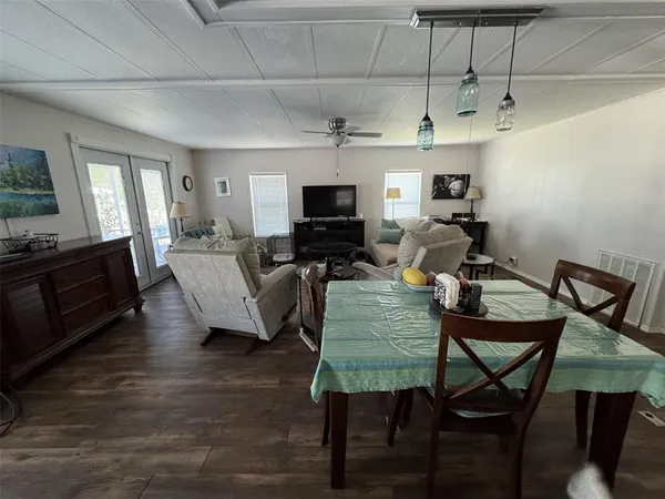 a kitchen with a sink and a refrigerator