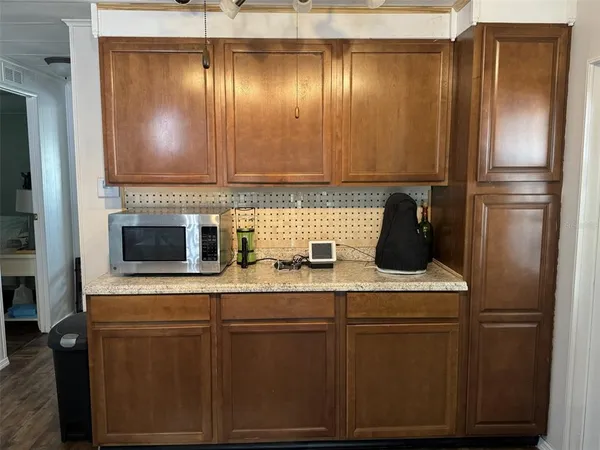 a kitchen with a refrigerator stove and sink