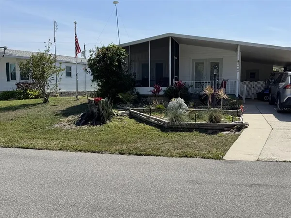 a house view with a garden space