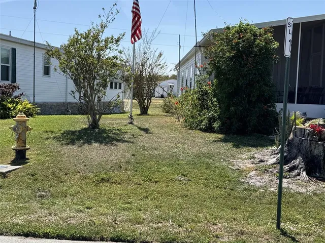 a view of a backyard with plants