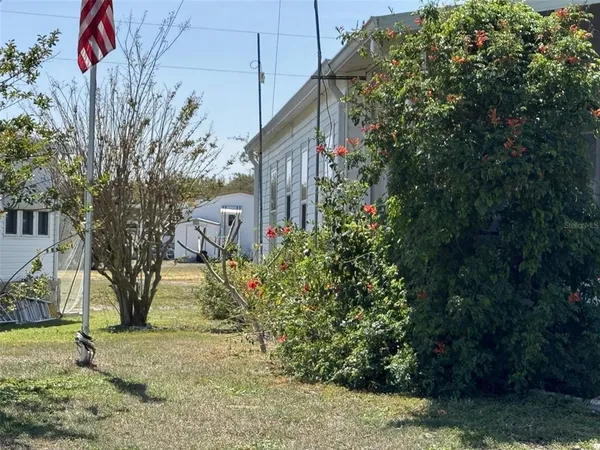 a backyard of a house with lots of green space