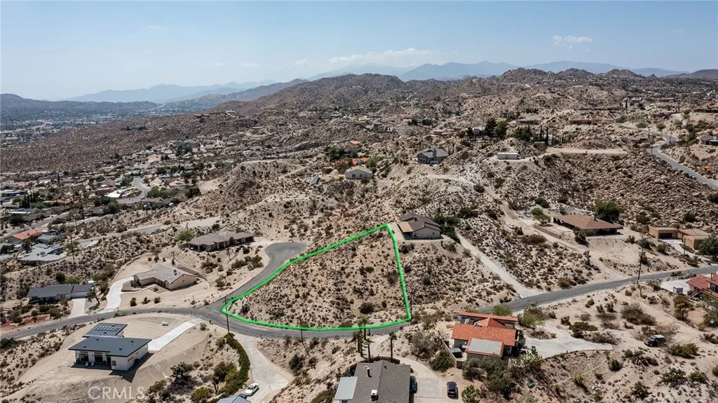 999 Mandarin Road Yucca Valley, CA 92284 - Photo 6 of 13 an aerial view of residential house and outdoor space