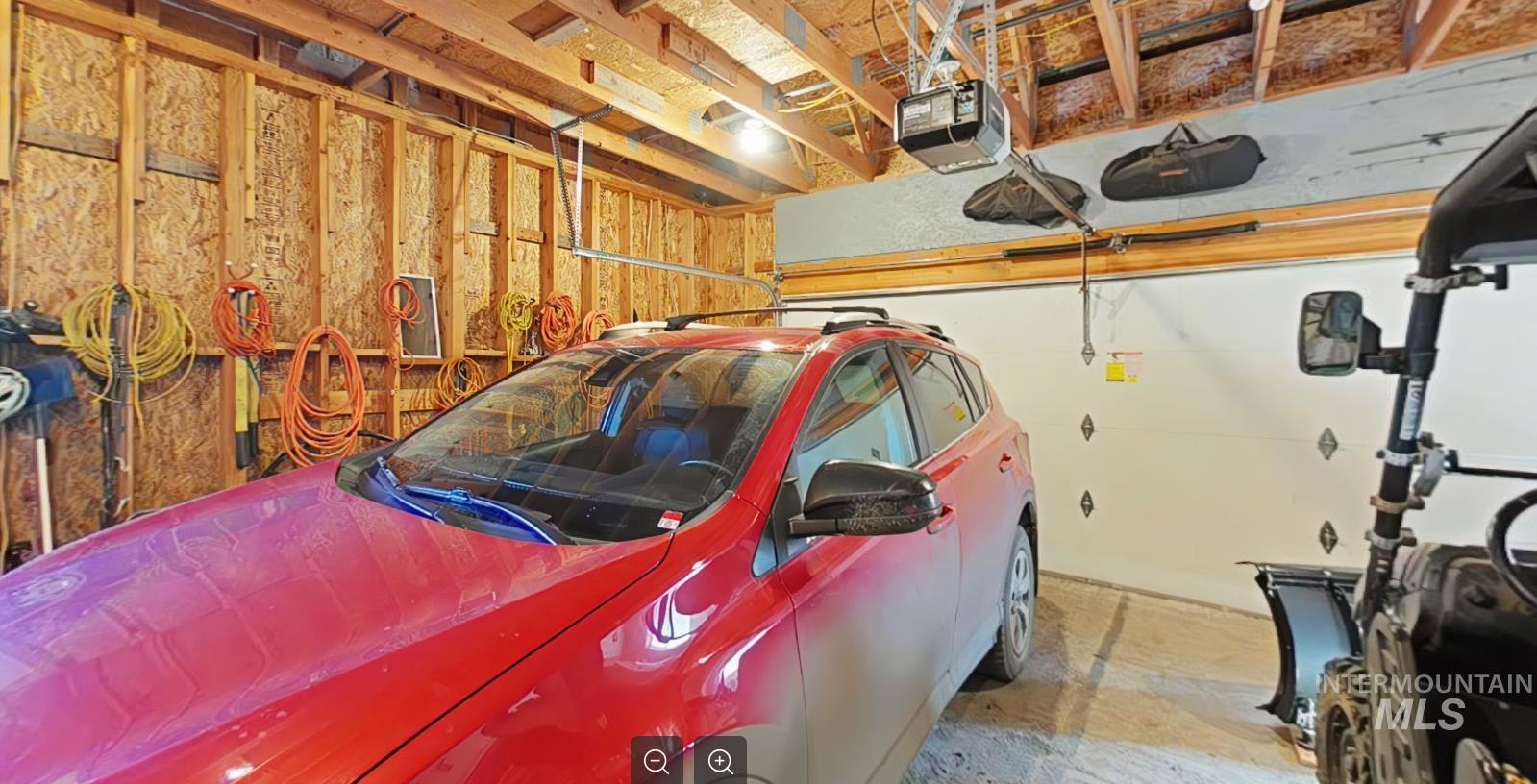 5288 Lakeview Road Orofino, ID 83544 - Photo 34 of 36 Garage featuring a garage door opener