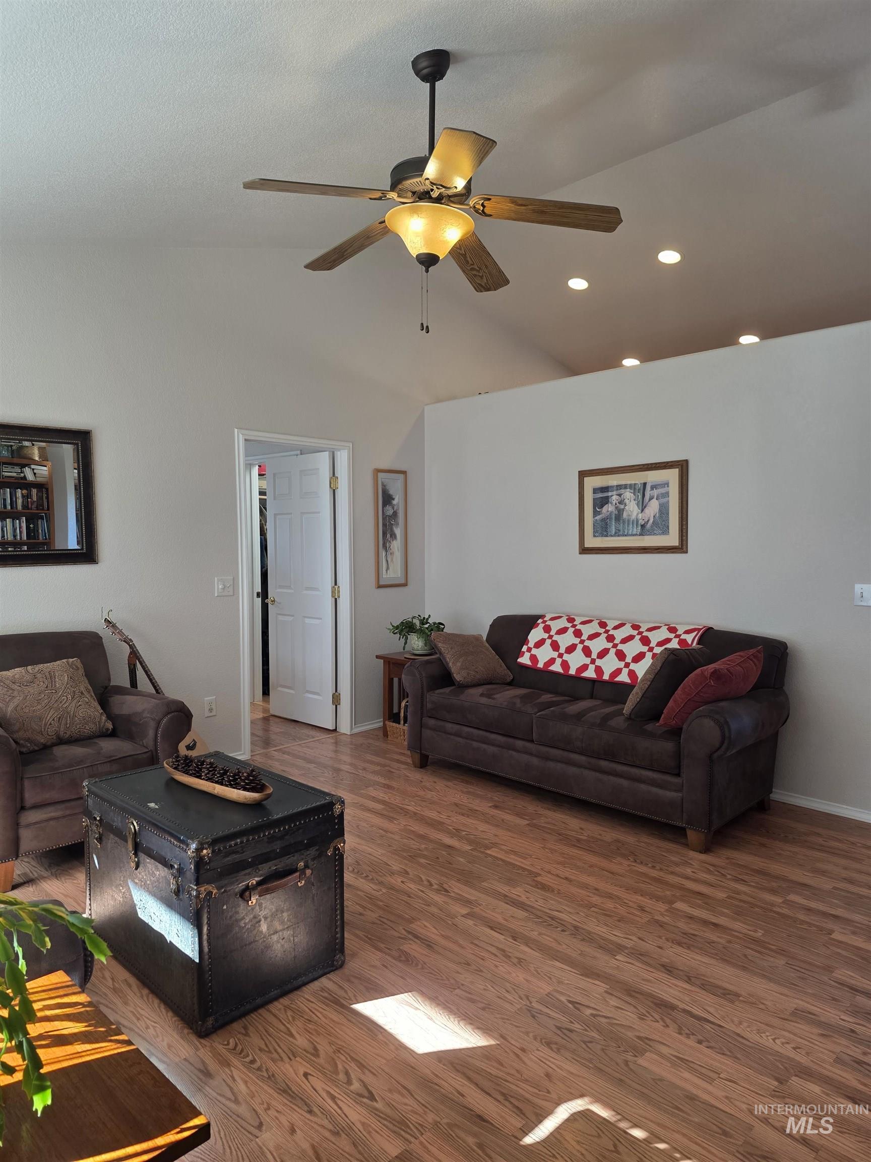 5288 Lakeview Road Orofino, ID 83544 - Photo 8 of 36 Living area with wood finished floors, vaulted ceiling, recessed lighting, and a ceiling fan