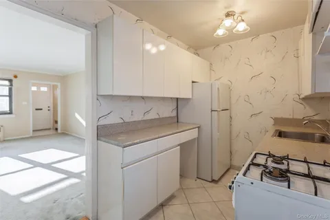 $385,000 | 107 15th Street, Unit E1, Garden City, NY 11530