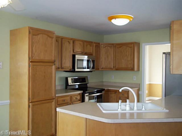 5248 Springhouse Farm Road Winston-Salem, NC 27107 - Photo 5 of 14 Kitchen. Kitchen features New LG Stainless Appliances