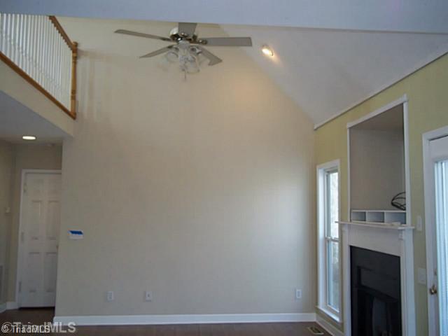 5248 Springhouse Farm Road Winston-Salem, NC 27107 - Photo 6 of 14 Living Room. Living Room open to Kitchen with Gas Logs and Oversized TV Niche