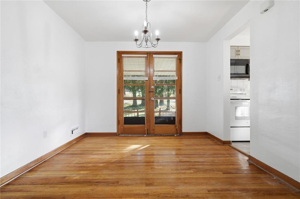 2055 Washington Road Pittsburgh, PA 15241 - Photo 11 of 31 wooden floor in an empty room with a window