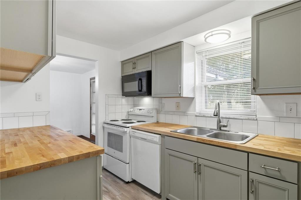 2055 Washington Road Pittsburgh, PA 15241 - Photo 24 of 31 a kitchen with a sink and cabinets