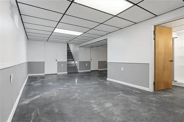 a bathroom with a shower and a toilet