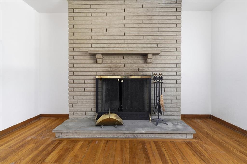 2055 Washington Road Pittsburgh, PA 15241 - Photo 9 of 31 a view of fireplace and wooden floor