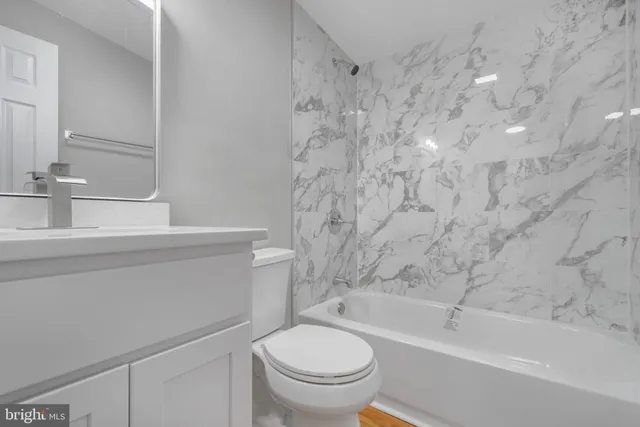 a view of a small space with wooden floor