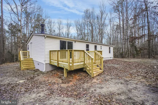 a view of a yard with an outdoor space