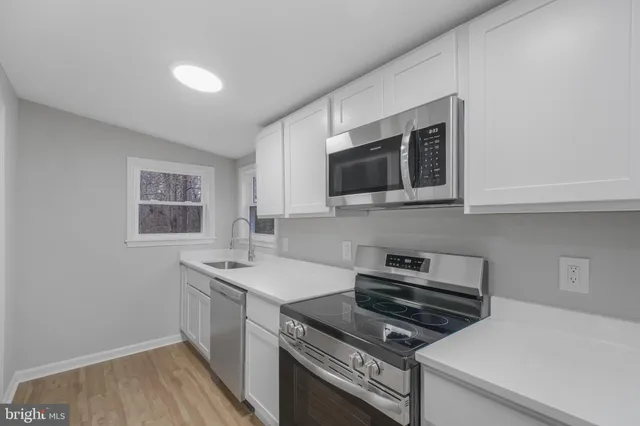 a close view of a sink and a window