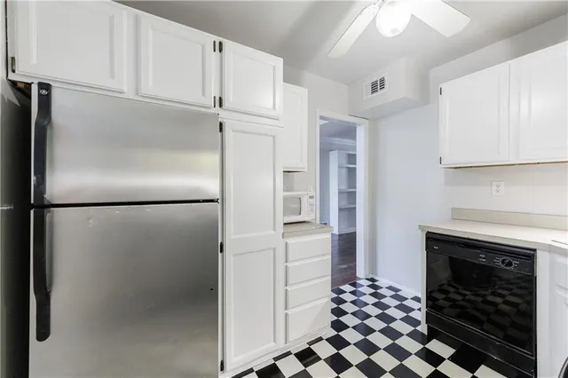 a bathroom with a sink mirror toilet and bathtub