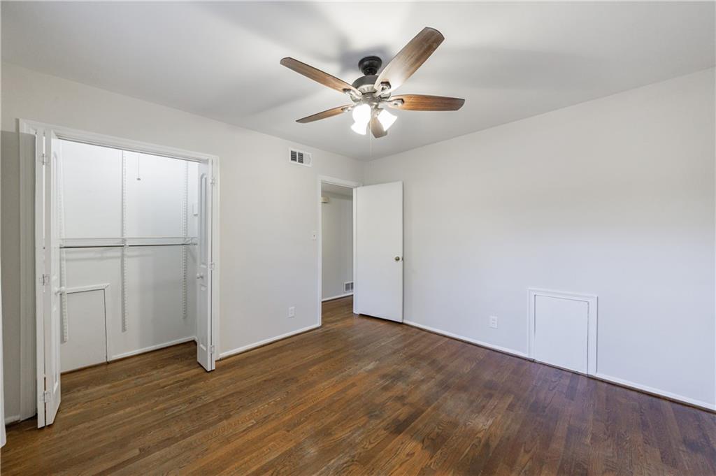 3660 Peachtree Road Northeast, Unit H2 Atlanta, GA 30319 - Photo 22 of 55 a view of an empty room with wooden floor