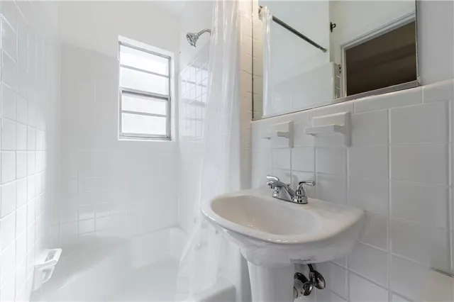 a view of a swimming pool with a lounge chair